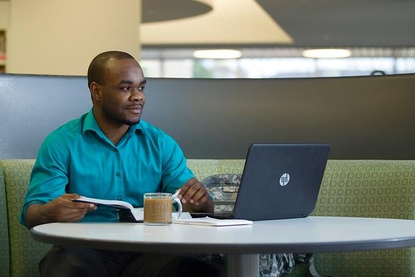 Student studying at the library