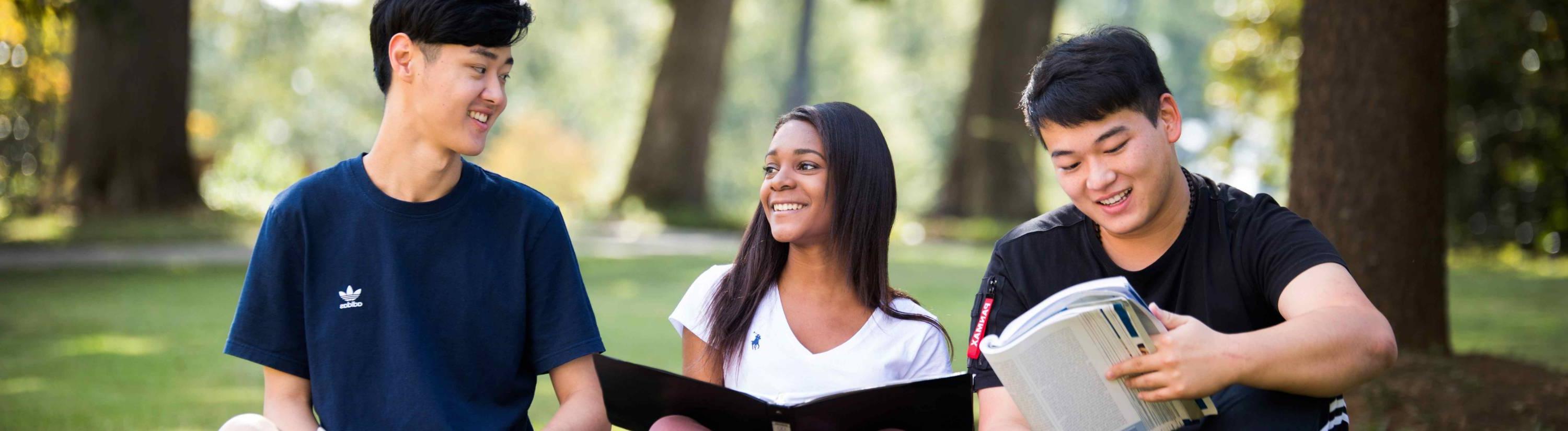 Students sitting outside.