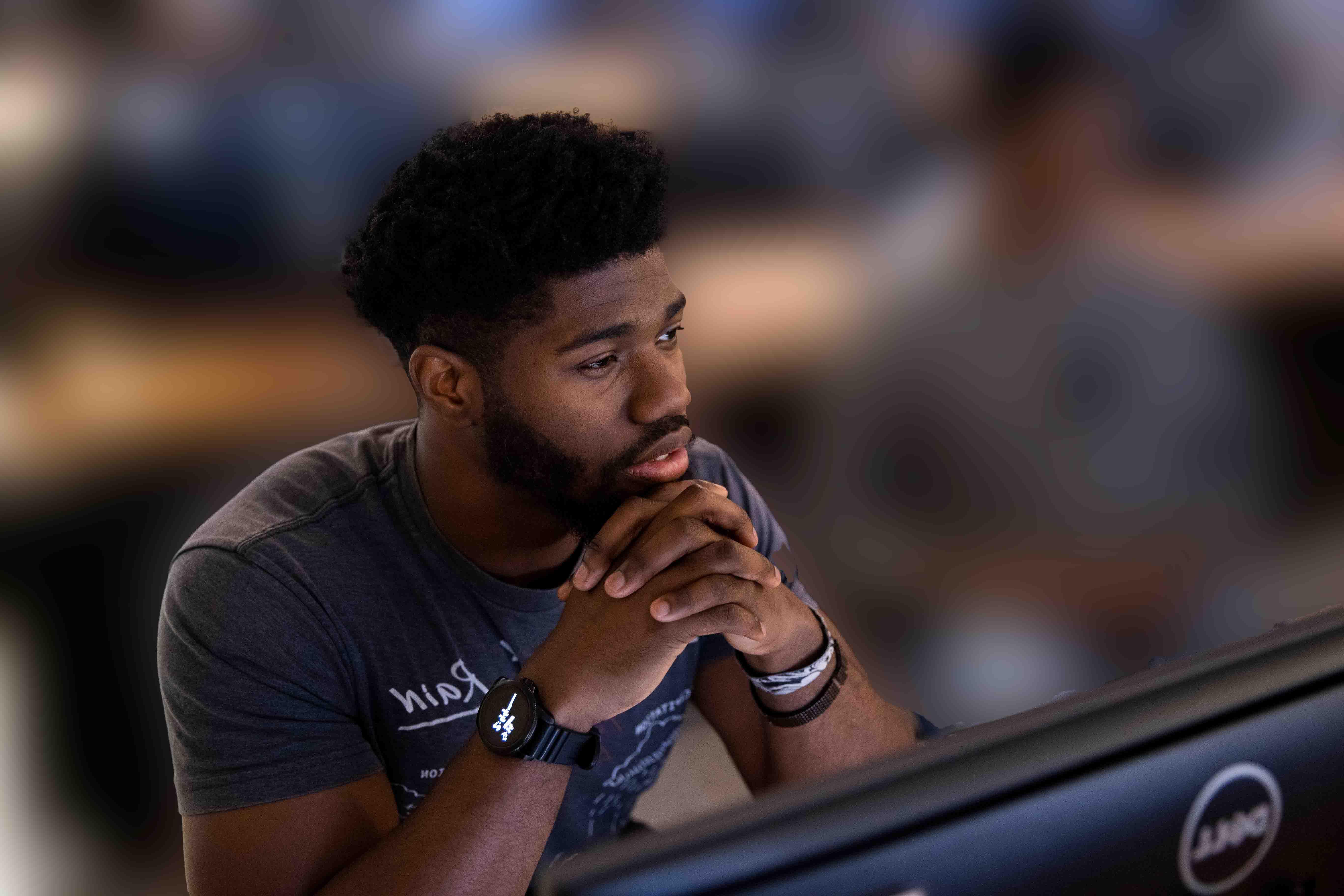 A guy sitting at a computer